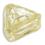 0.5 carat fancy yellow, flat triangular raw diamond
