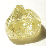 0.32 carat included triangular rough diamond