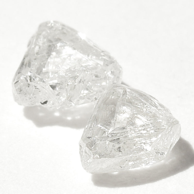 0.86 carat triangular raw diamond pair