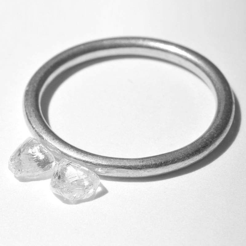 0.67 carat triangular raw diamond pair