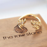 Leaf themed band with white sapphires