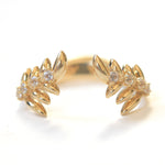 Wing themed band in 14k yellow gold with 8 white sapphires