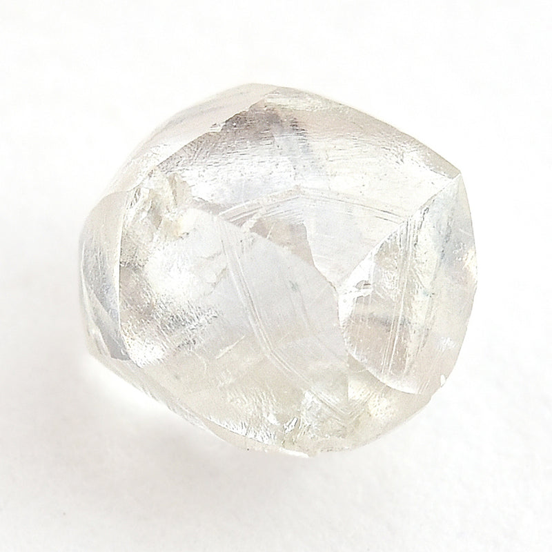 0.74 carat waterlike and gemmy raw diamond rhombododecahedron