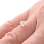 0.74 carat waterlike and gemmy raw diamond rhombododecahedron