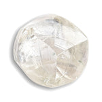 0.74 carat waterlike and gemmy raw diamond rhombododecahedron