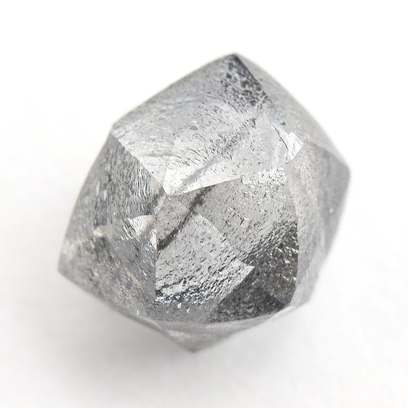 0.87 carat black and white raw diamond dodecahedron