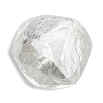 0.90 carat gleaming and colorless rough diamond dodecahedron