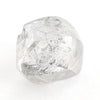 0.90 carat gleaming and colorless rough diamond dodecahedron