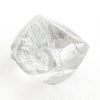 0.90 carat gleaming and colorless rough diamond dodecahedron