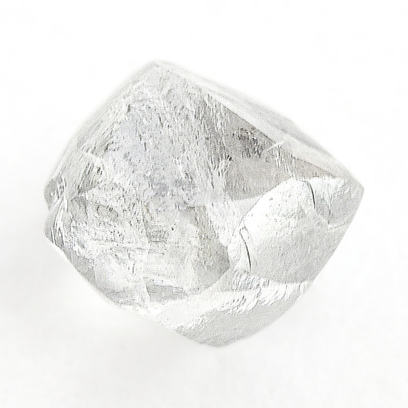 0.90 carat gleaming and colorless rough diamond dodecahedron