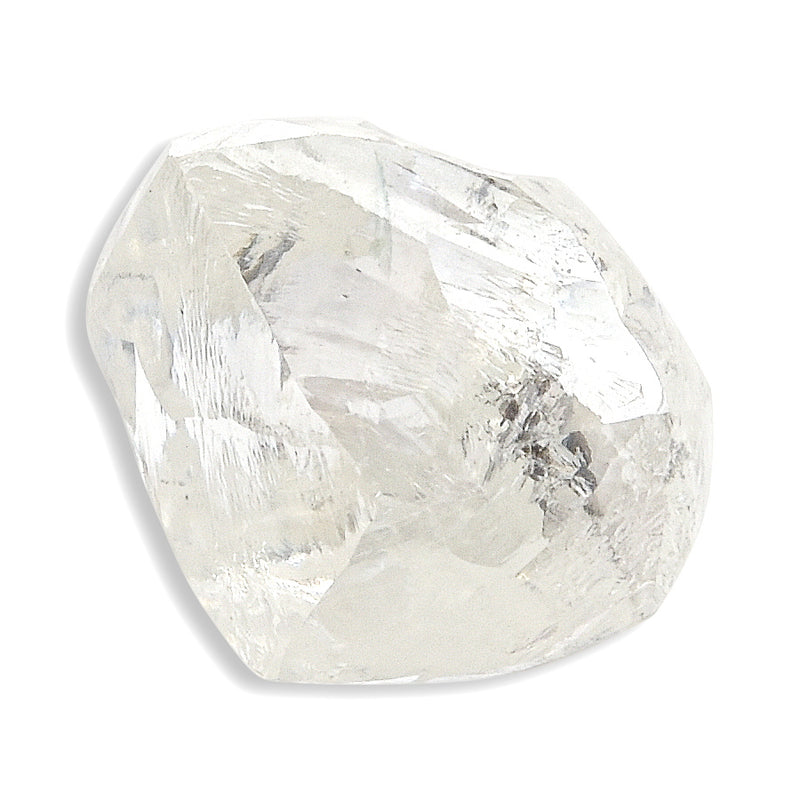 0.90 carat smooth and white raw diamond dodecahedron