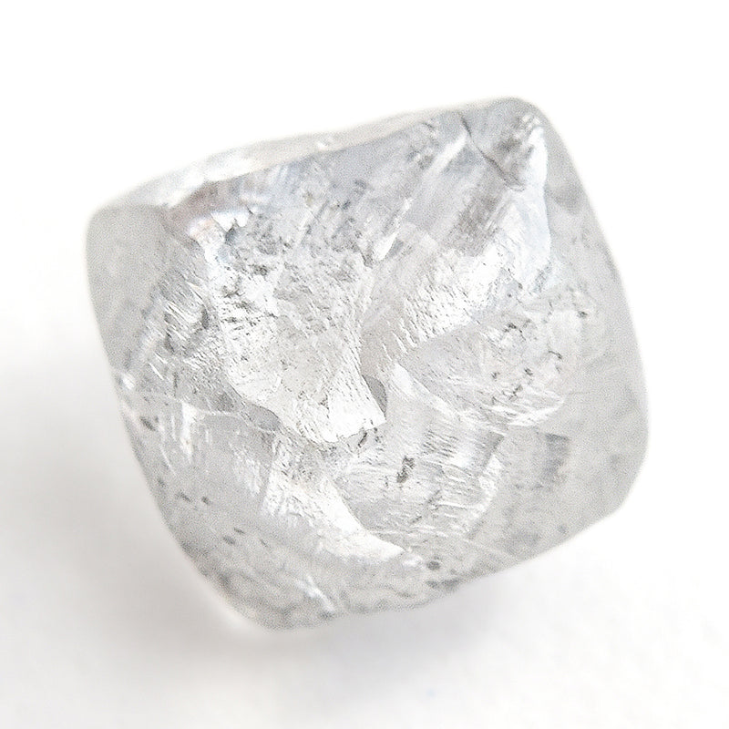 0.90 carat silver and white internal raw diamond dodecahedron