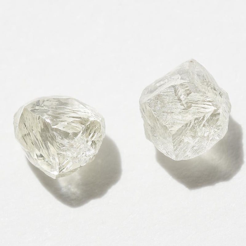 1.55 carat light yellow raw diamond pair