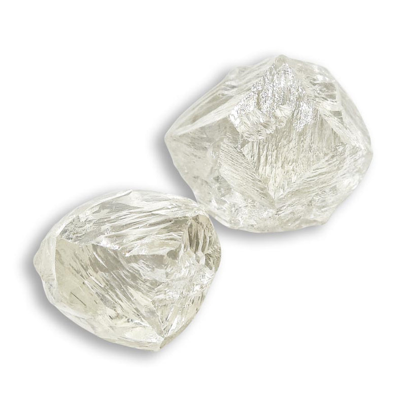 1.55 carat light yellow raw diamond pair
