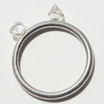 0.72 carat silver white raw diamond octahedron pair