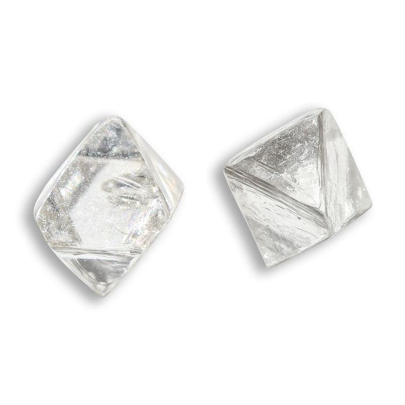 0.72 carat silver white raw diamond octahedron pair