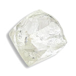 1.06 carat white and waterlike raw diamond dodecahedron