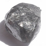 1.5 carat jet black raw diamond triangle