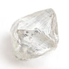 1.61 carat silvery and white rough diamond dodecahedron
