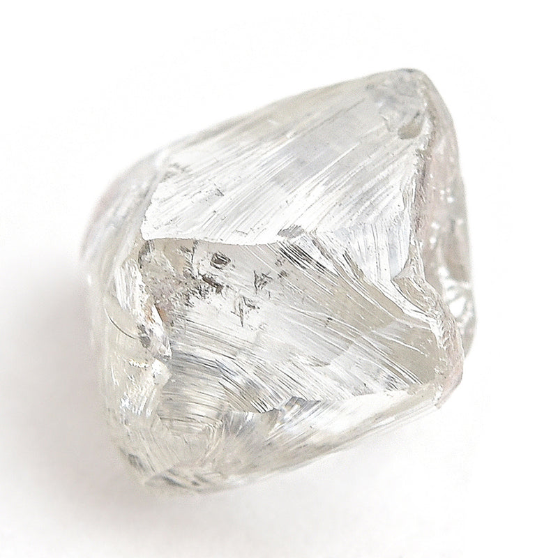 1.61 carat silvery and white rough diamond dodecahedron