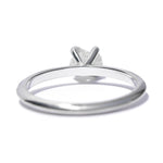 Uncut diamond engagement ring in a delicate setting of 14k white gold and four prongs.