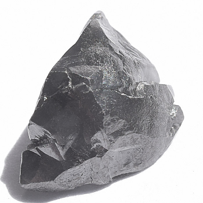1.55 carat triangular jet black raw diamond