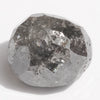 2.32 carat sparkly black demi-cut raw diamond