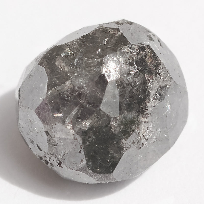 2.32 carat sparkly black demi-cut raw diamond