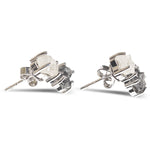 Black and white rough diamond earrings in white gold