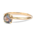 Lagoon green sapphire engagement ring with a minimalist band, 14k yellow gold four prongs and ethically sourced