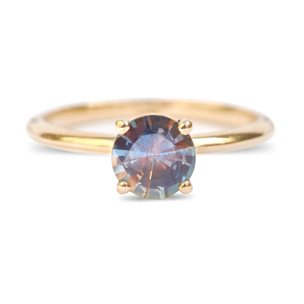 Lagoon green sapphire engagement ring with a minimalist band, 14k yellow gold four prongs and ethically sourced