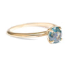 Montana sapphire teal sapphire engagement ring in a delicate band 14k yellow gold size 6 and ready to ship. Ethically sourced from Montana USA.