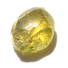 1.09 carat olive green freeform shaped raw diamond