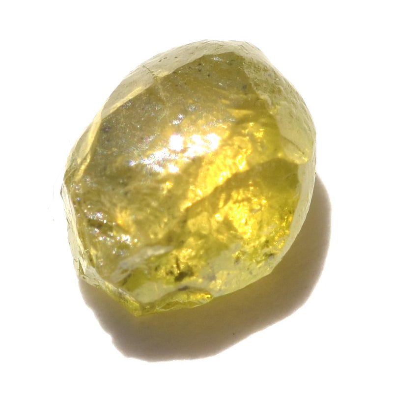 1.09 carat olive green freeform shaped raw diamond