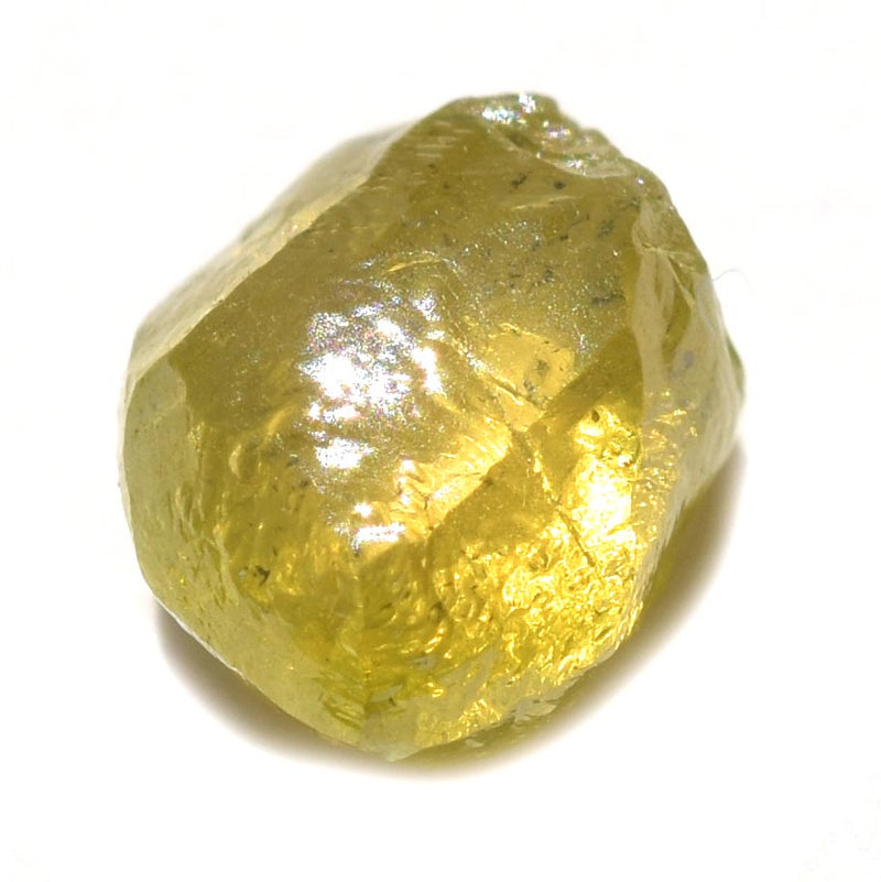 1.09 carat olive green freeform shaped raw diamond