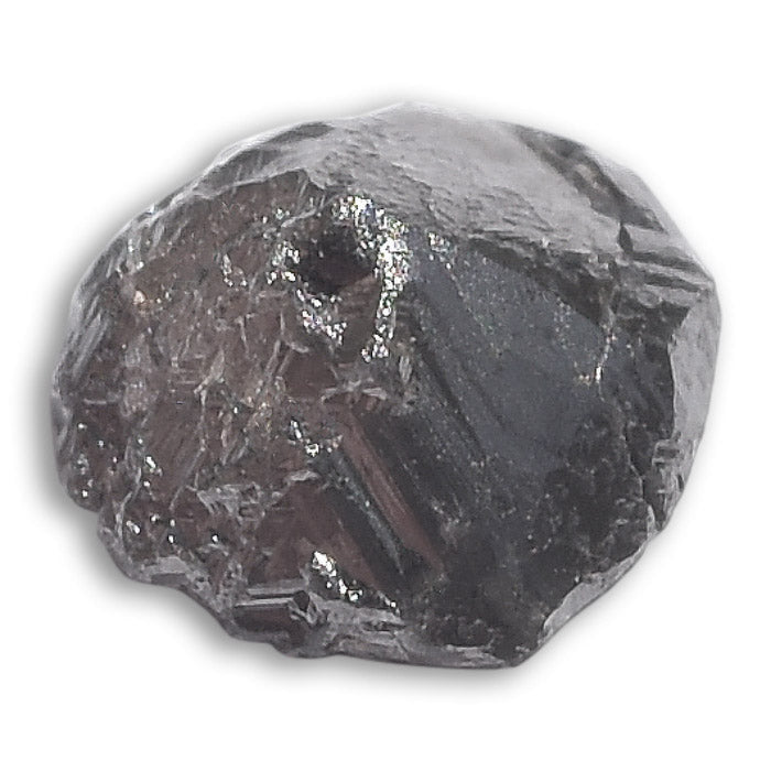 0.23 carat half octahedron black raw diamond