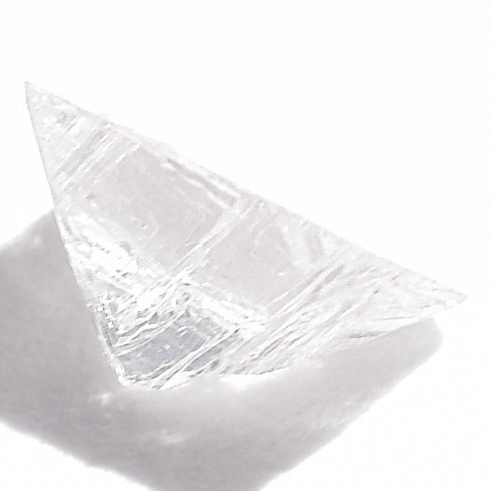 0.24 carat half octahedron white raw diamond