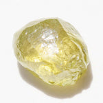 0.68 carat lemon lime raw diamond dodecahedron