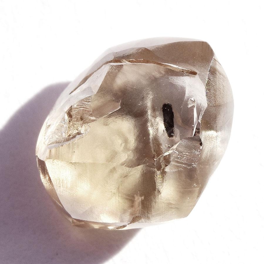 2.99 carat cognac colored rough diamond dodecahedron