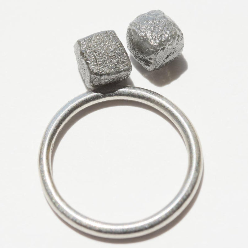 4.72 carat silver gray cubical raw diamond pair