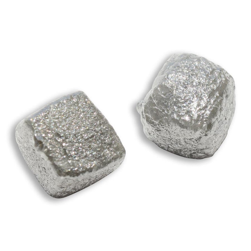 4.72 carat silver gray cubical raw diamond pair