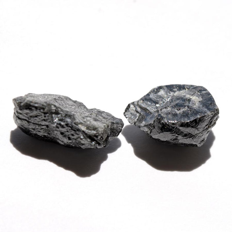 14.43 carat oblong black raw diamond pair