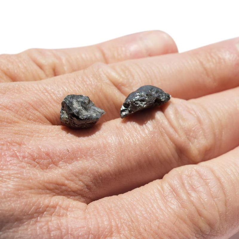 14.43 carat oblong black raw diamond pair