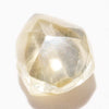 1.76 carat tear drop shaped rough diamond rhombododecahedron