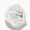 1.15 carat round and white raw diamond dodecahedron