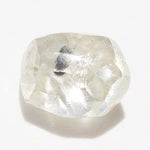 0.57 carat light and clear raw diamond rhombododecahedron