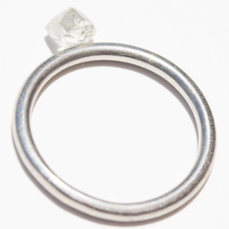 0.64 carat triangular white raw diamond freeform shaped stone