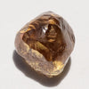 1.23 carat cognac colored freeform shaped raw diamond