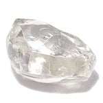 0.67 carat bright white and clear rough diamond dodecahedron