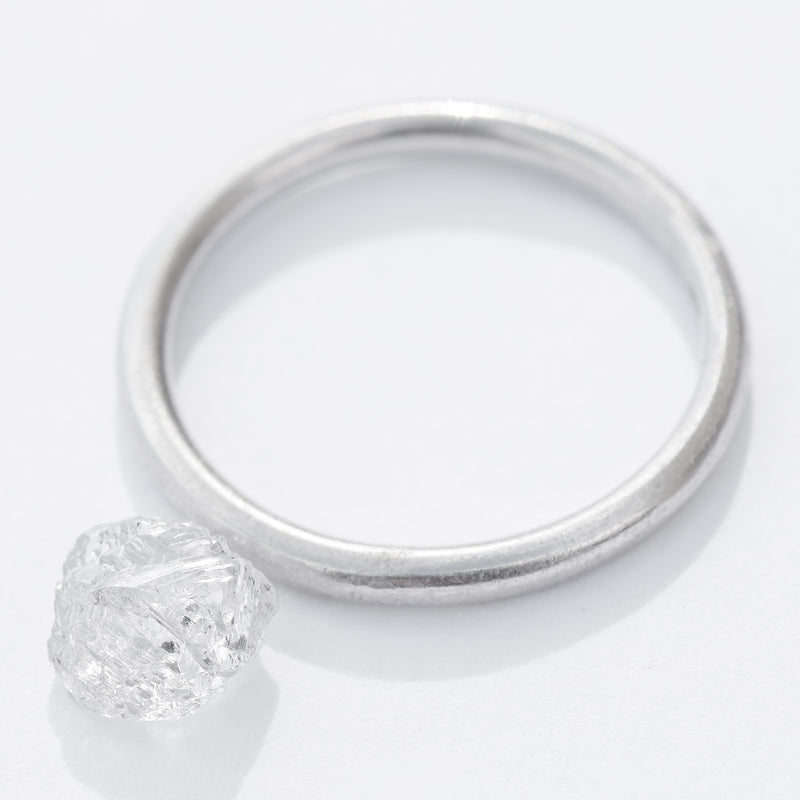 1.29 carat clear and geometrical white raw diamond maccle